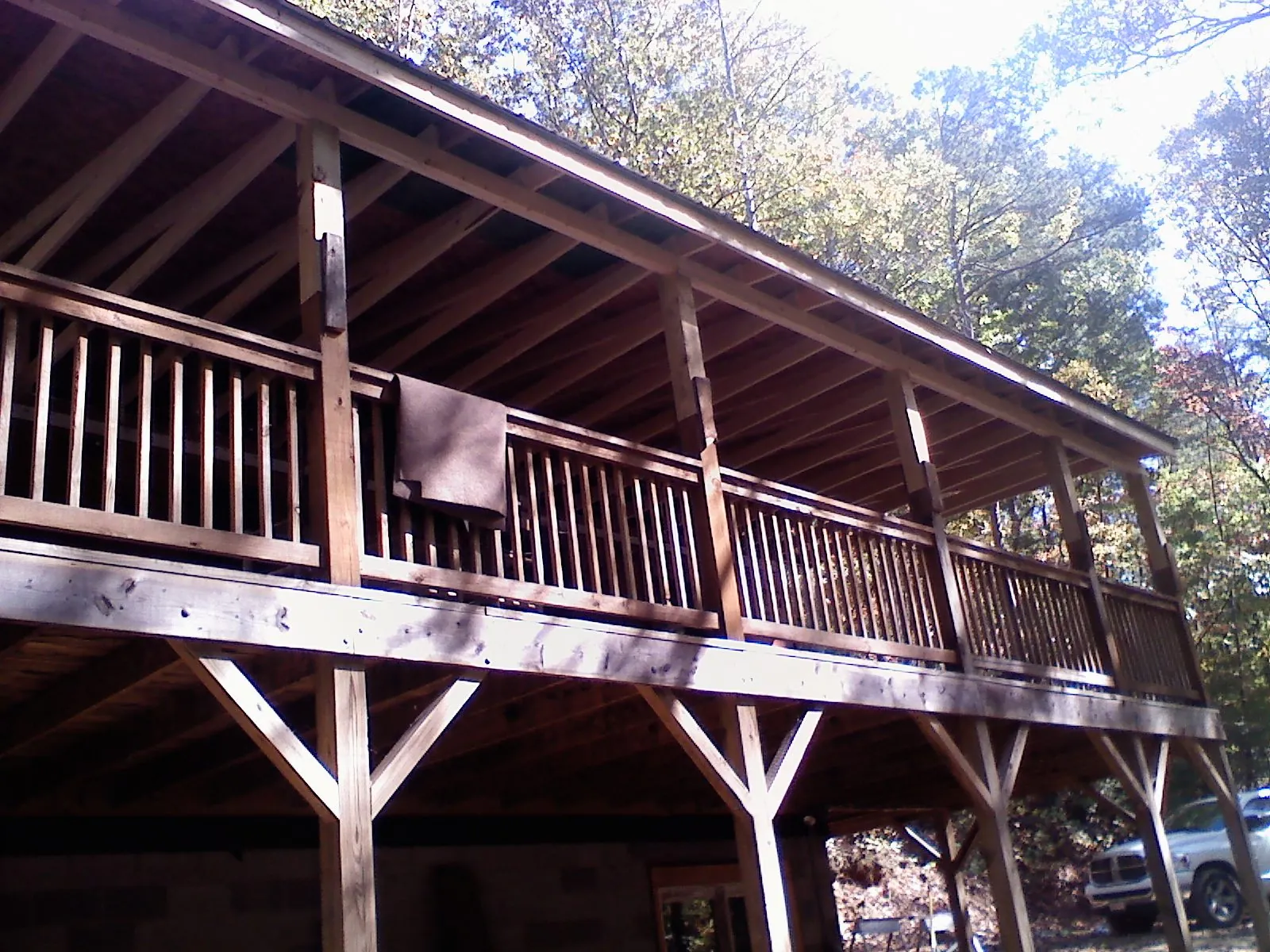 Timber framing under a new elevated porch and deck — Roof Leak Repair in Sturtevant by Roofing Brothers